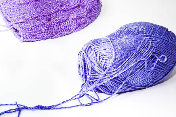 istock Blue wool skein and cup on a white background 466146778