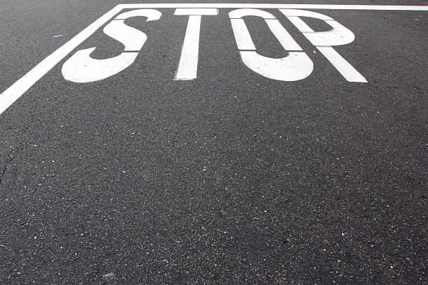 istock Stop Sign Painted on Street 466147530