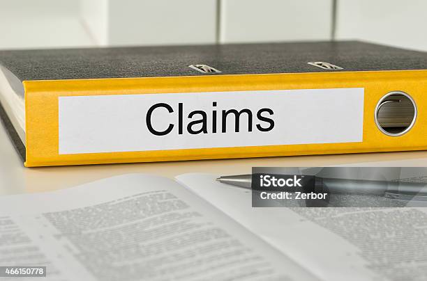 Folder With The Label Claims Stock Photo - Download Image Now - Claim Form, Assertiveness, Insurance