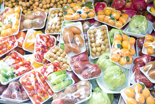 frutas e produtos hortícolas - pacote plastico imagens e fotografias de stock
