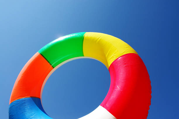 anello nuoto sul lago - inflatable ring inflatable float swimming equipment foto e immagini stock