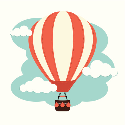 A Hot air balloon against a cloudy sky