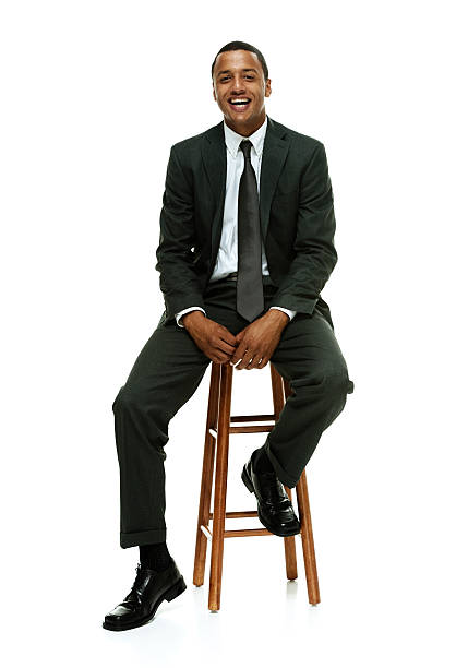 istock Happy businessman on stool and looking at camera 466155872
