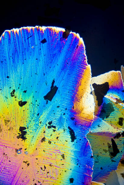 istock Polarized and magnified soot particles and micro crystals 466158420