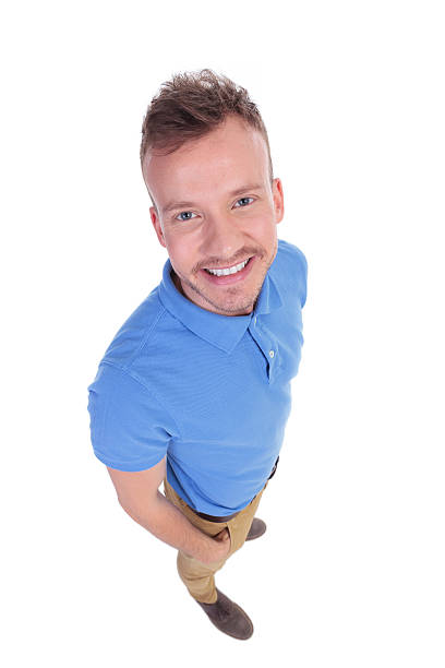 istock young man looks up at camera 466159450