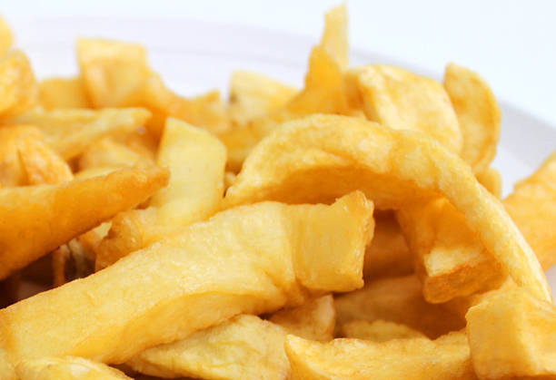 istock Image of greasy chips from takeaway fish and chip shop 466159516