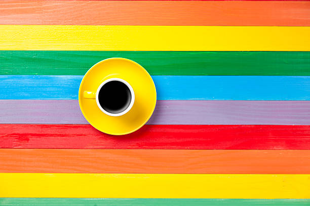 istock Cup of coffee in yellow cup 466160112