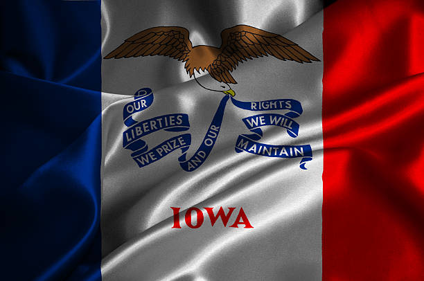 Iowa flag Iowa flag on satin texture. iowa flag stock pictures, royalty-free photos & images