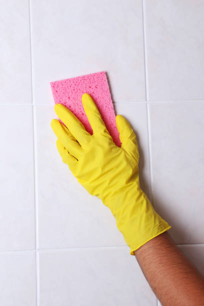 istock Cleaning kitchen tiles with sponge 466160960