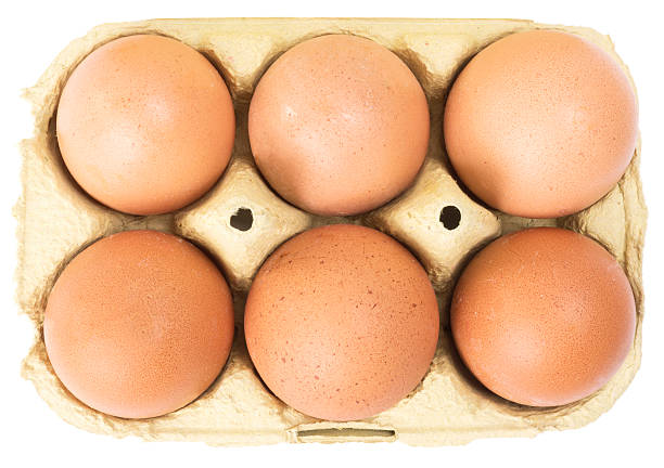 istock eggs in cardboard crate. top view. isolated over white background. 466160992