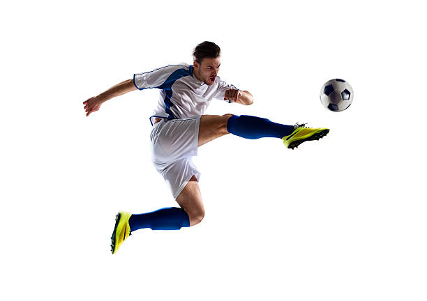 fußballspieler in aktion - fußballspieler stock-fotos und bilder