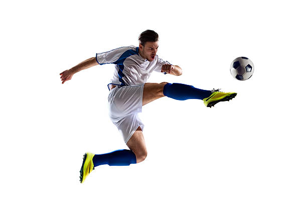 soccer player in action football soccer player in action  isolated white background athletes stock pictures, royalty-free photos & images