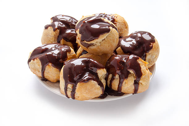 istock Homemade profiteroles with chocolate cream 466170327