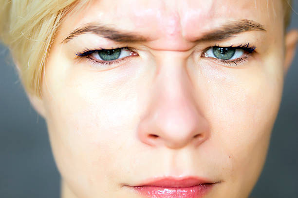 istock Upset woman wrinkling her forehead 466172245