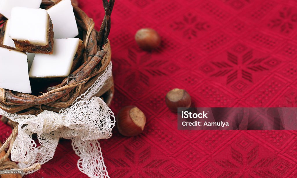 Handmade cookies in a basket on a table Holidays, love, food and drink concept. Handmade cookies in a basket on a red table in a vintage style. Selective focus, copy space background 2015 Stock Photo