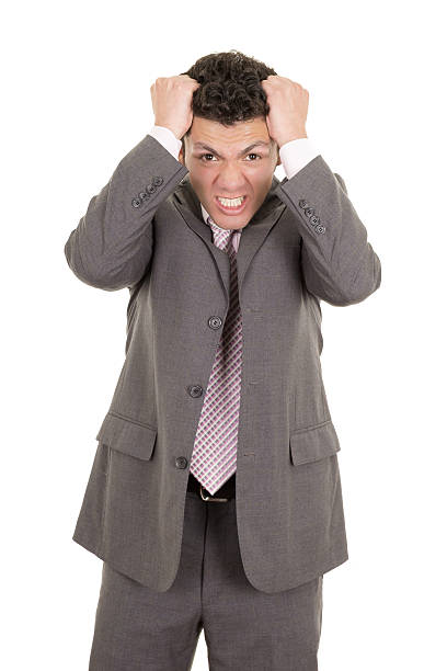 istock hispanic stressed businessman in suit 466173711