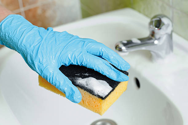istock Bathroom sink faucet cleaning 466175190