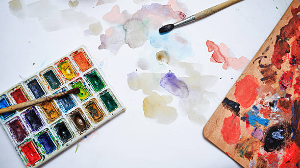 istock Brush and watercolor paint on paper 466175258