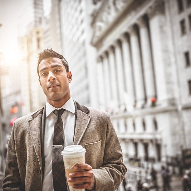 istock Businessman with coffee mug in brooklyn bridge 466176389