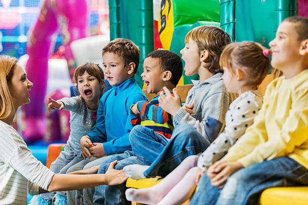 istock Children singing with their teacher. 466176567