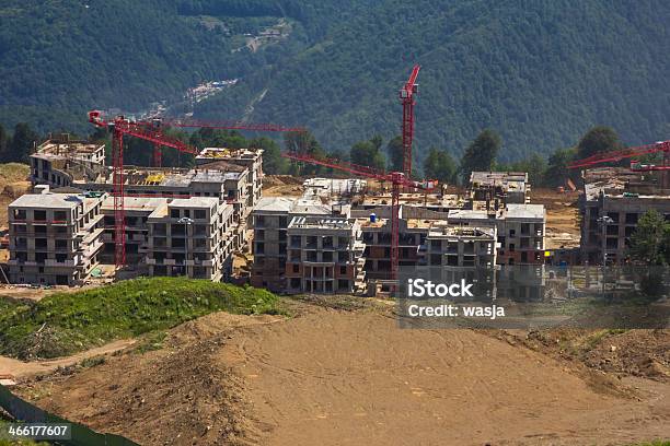 Building In The Mountains Stock Photo - Download Image Now - Architecture, Backhoe, Blue