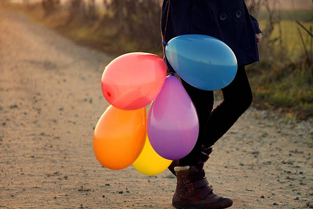 istock Little shoes and balloons 466178035