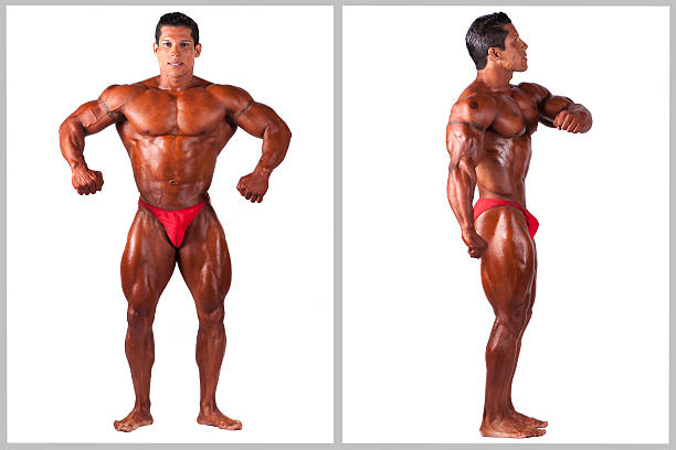 Handsome muscular fit young man on studio background