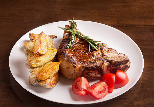 istock Grilled meat with vegetables and rosemary 466183324