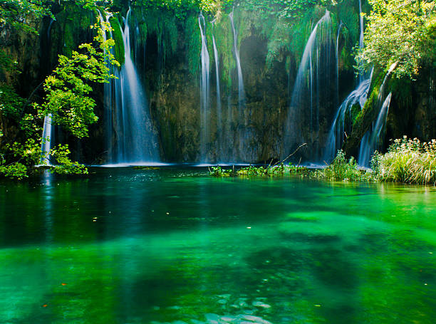 panoramic aerial view of a waterfall produced by the elsa river in tuscany