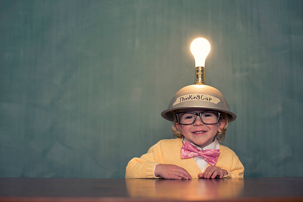 little grandes idées - blackboard child thinking little girls photos et images de collection