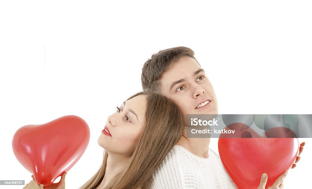Young couple dreaming Young romantic valentine's couple isolated on white Activity Stock Photo