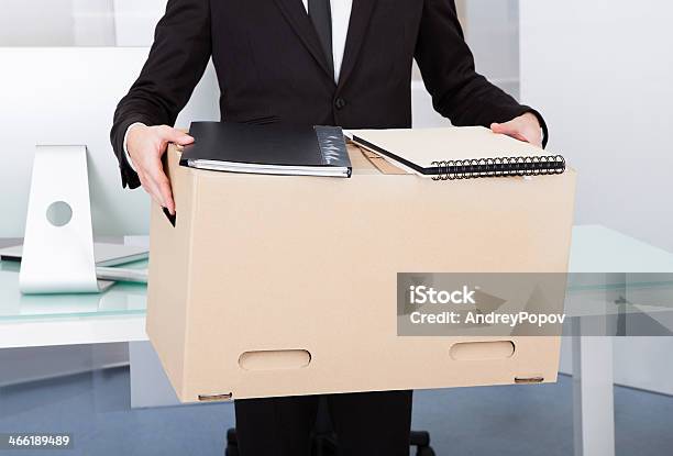 Businessman Holding Box Stock Photo - Download Image Now - Activity, Adult, Adults Only