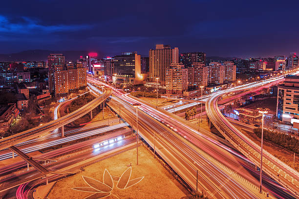 istock The light trails on the modern building background in Beijing china. 466190724