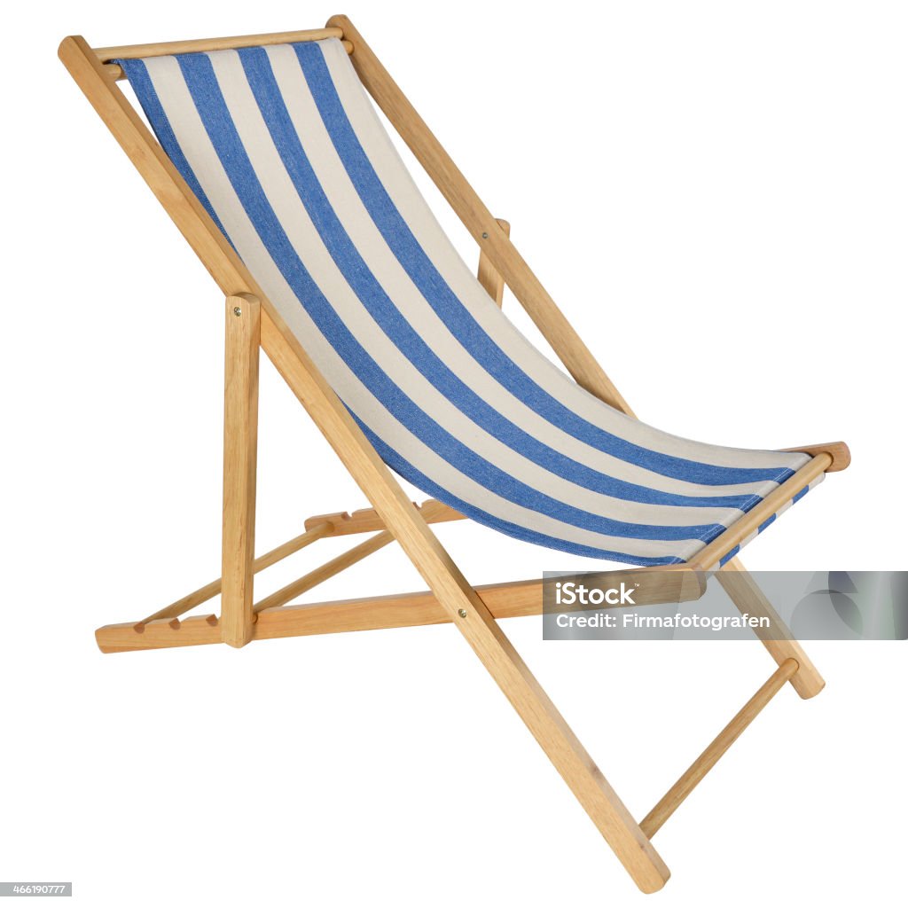 Foldable Deck Chair In Pine And Fabric Isolated Deck chair with clipping path. Studio isolated on white background. Armchair Stock Photo