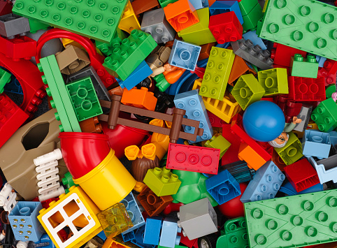 Tambov, Russian Federation - February 20, 2015: Heap of Lego Duplo Blocks and toys. Studio shot.  All toys in heap manufactured by the Lego Group (Billund, Denmark). Lego Duplo is a toys for children age 1,5-5.