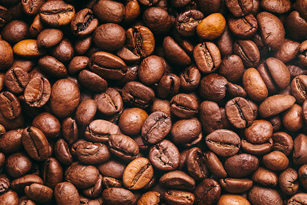 café textura de - bean macro brown roasted fotografías e imágenes de stock
