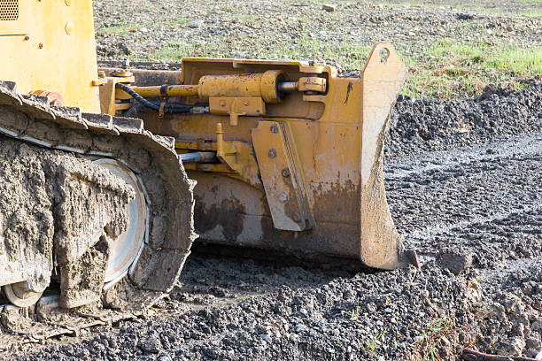 istock closeup of tracked loader excavator at construction area 466193778