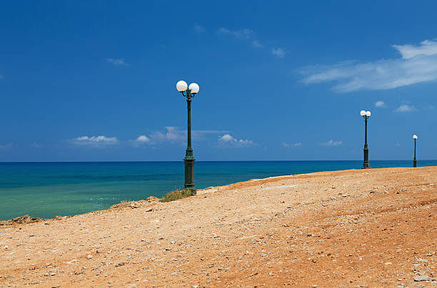 istock promenade with lampposts. 466195951