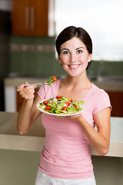 istock Smiling woman having fruits 466196142