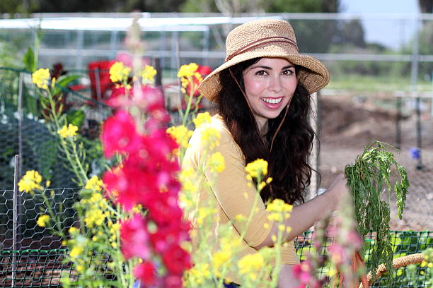 istock Community Garden Hispanic Woman Horizontal 466196194
