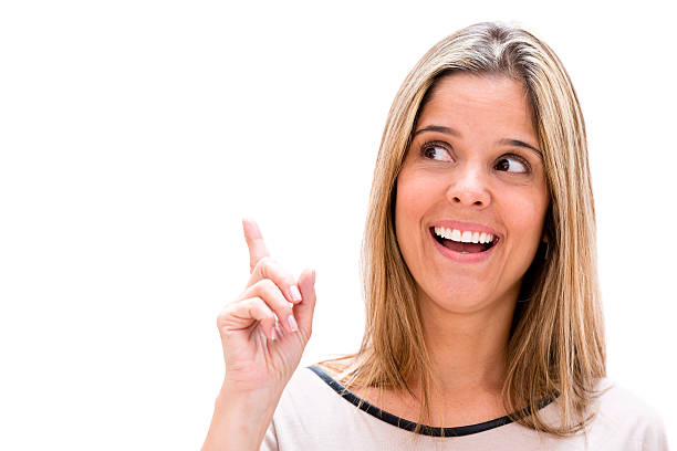 istock Thoughtful woman pointing an idea 466197385