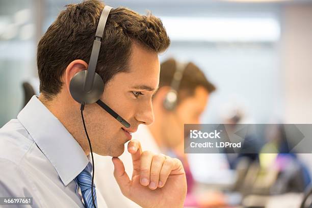 Call Center Team At Office On The Phone With Headset Stock Photo - Download Image Now