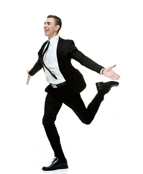 istock Happy businessman running with carefree attitude 466198112