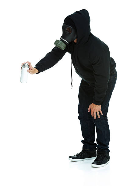 istock Graffiti artist in action with aerosol can 466198126
