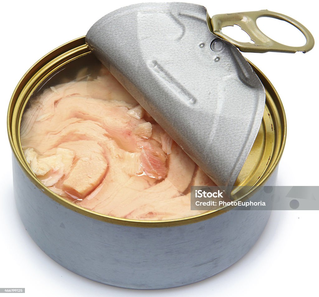 Half Opened Can of White Albacore Tuna Half Opened Can of White Albacore Tuna over white. Can Stock Photo