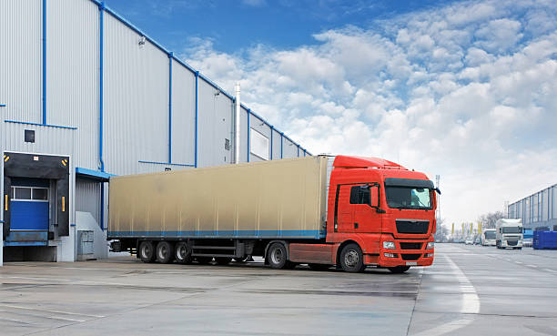 istock A cargo transport truck in front of a warehouse 466199893