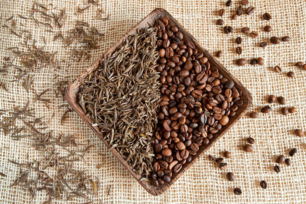istock dried tea leaves and roasted coffee beans: theine vs caffeine 466200850
