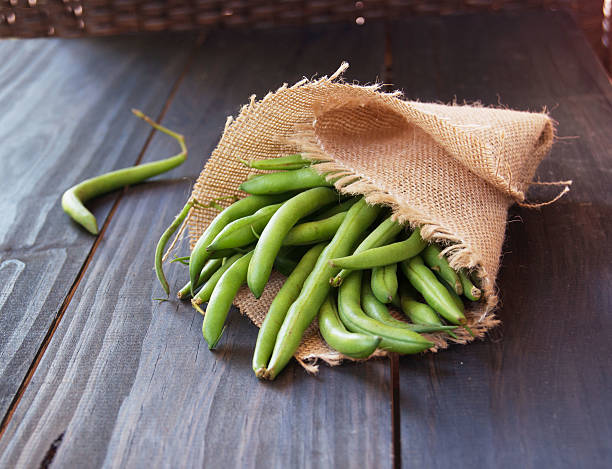 istock green beans in a linen bag on wooden 466201002