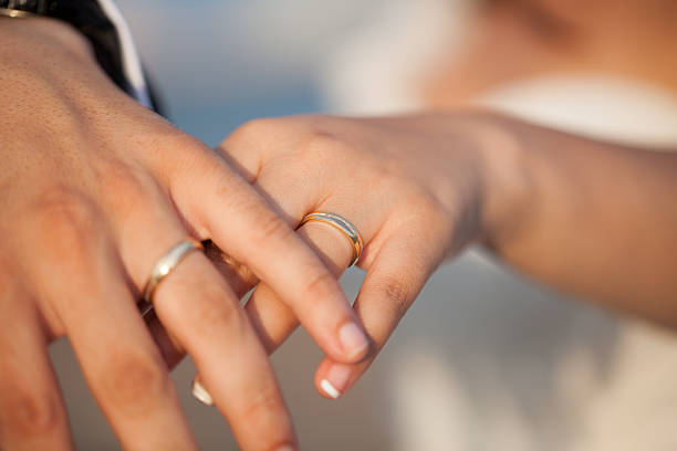 istock Hands of a newlywed couple 466202267
