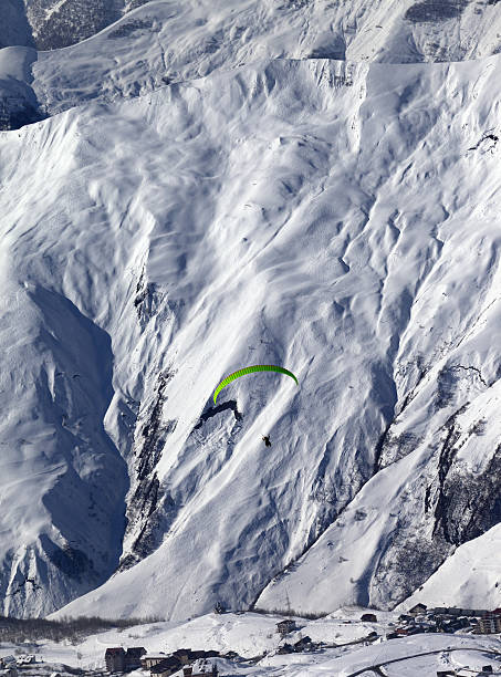 istock Speed riding in winter mountains at sun day 466202558